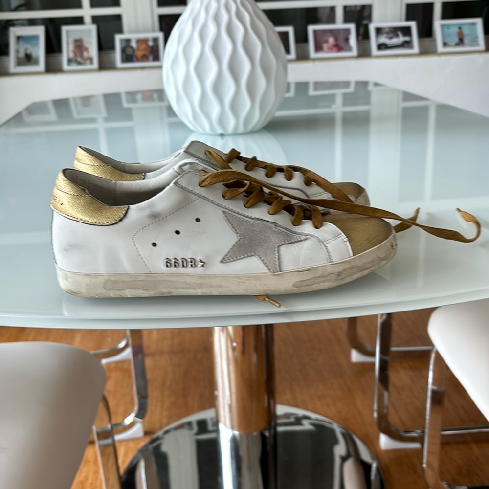 Golden Goose size 39 in Europe, the shoes brand is Made in Italy.